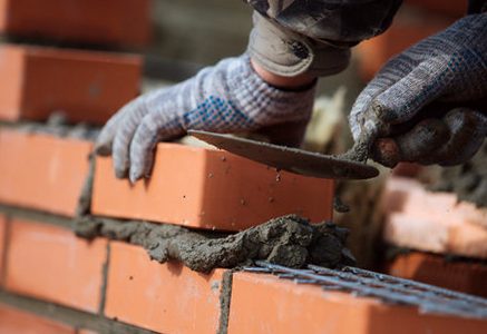 New courses going down brick by brick on fresh mortar